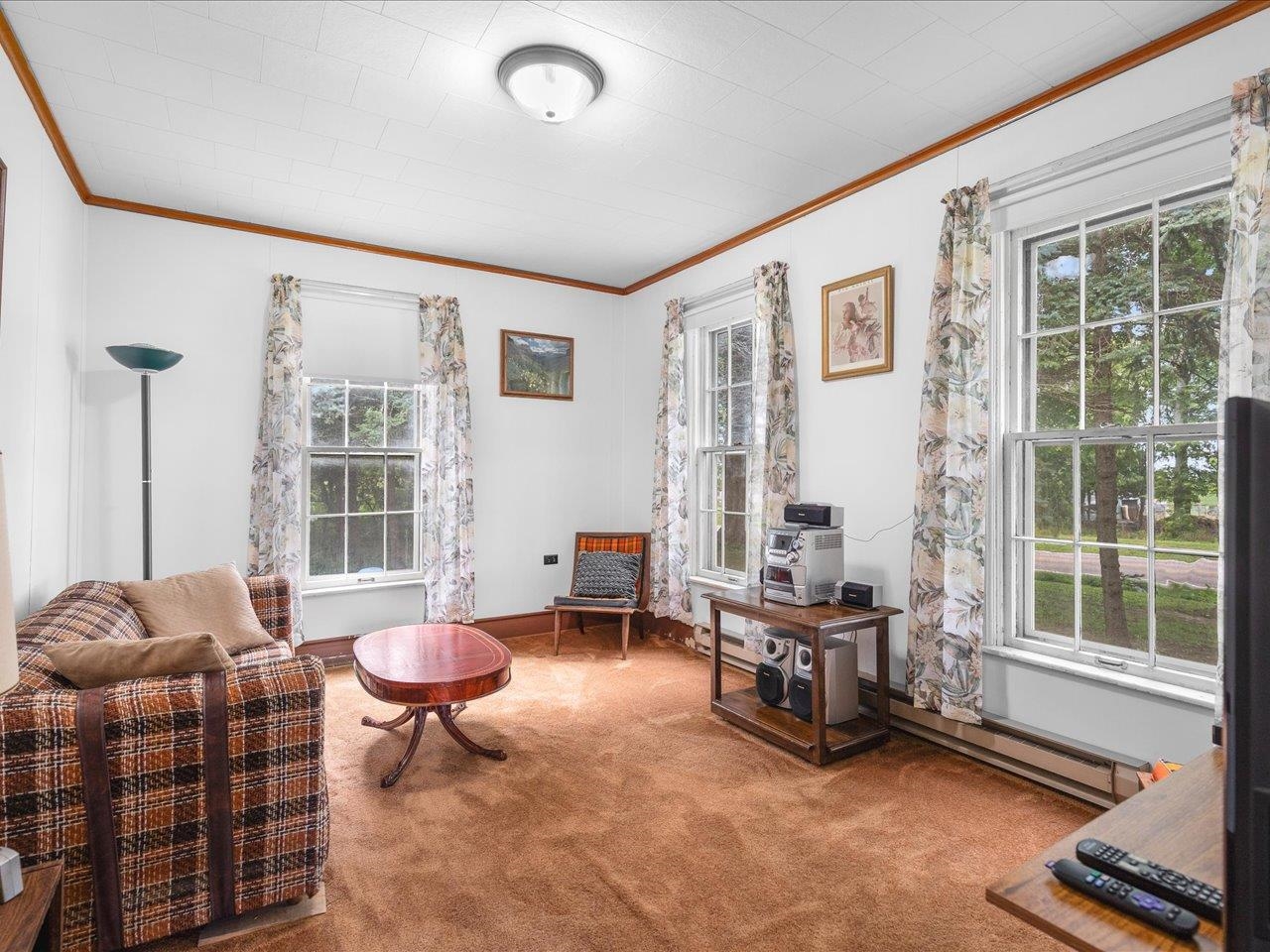 9311 State Line Road Capron, IL 61012 - Photo 39 of 51 a living room with furniture and a window