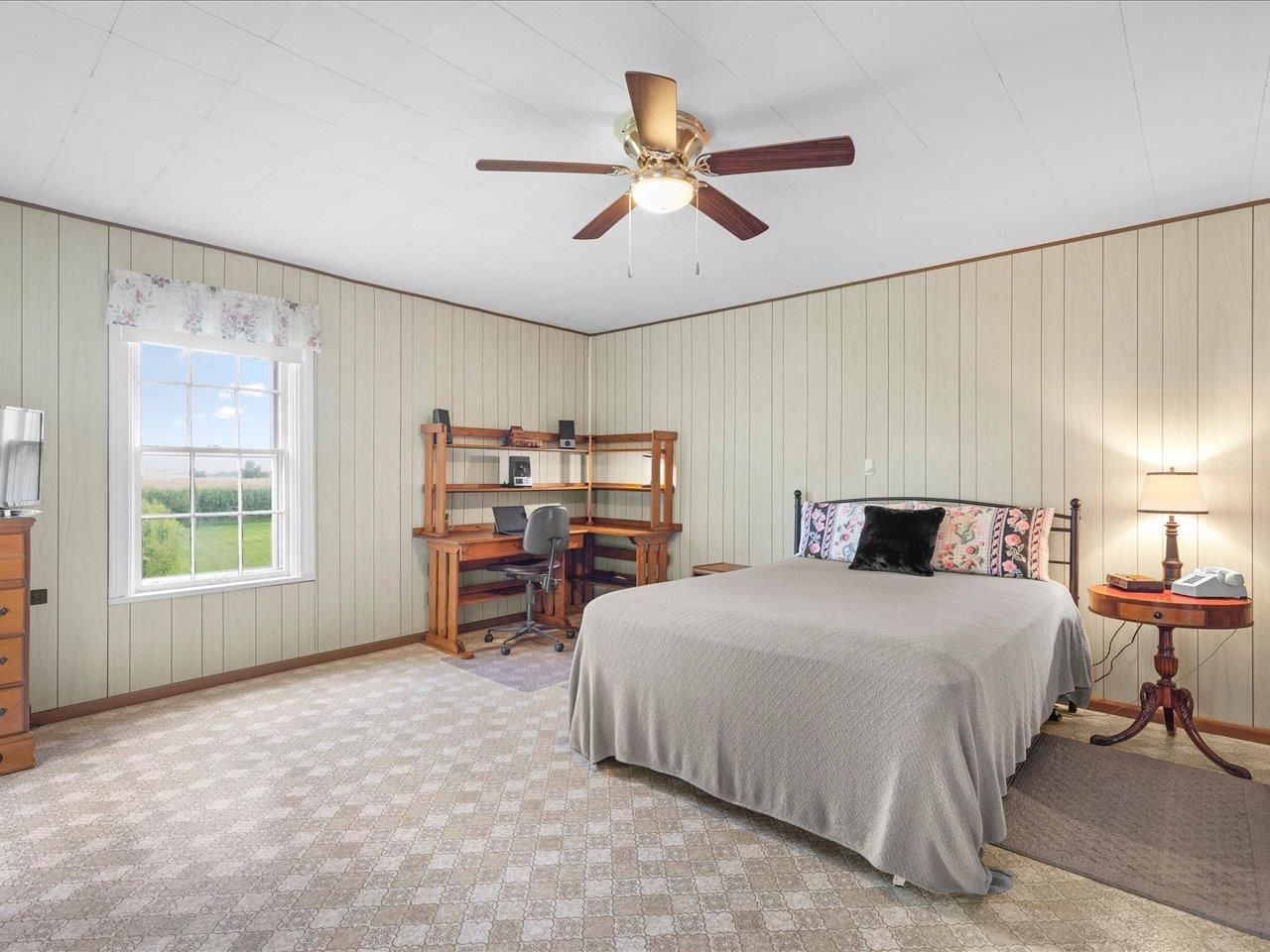 9311 State Line Road Capron, IL 61012 - Photo 44 of 51 a bedroom with a bed furniture and a large window