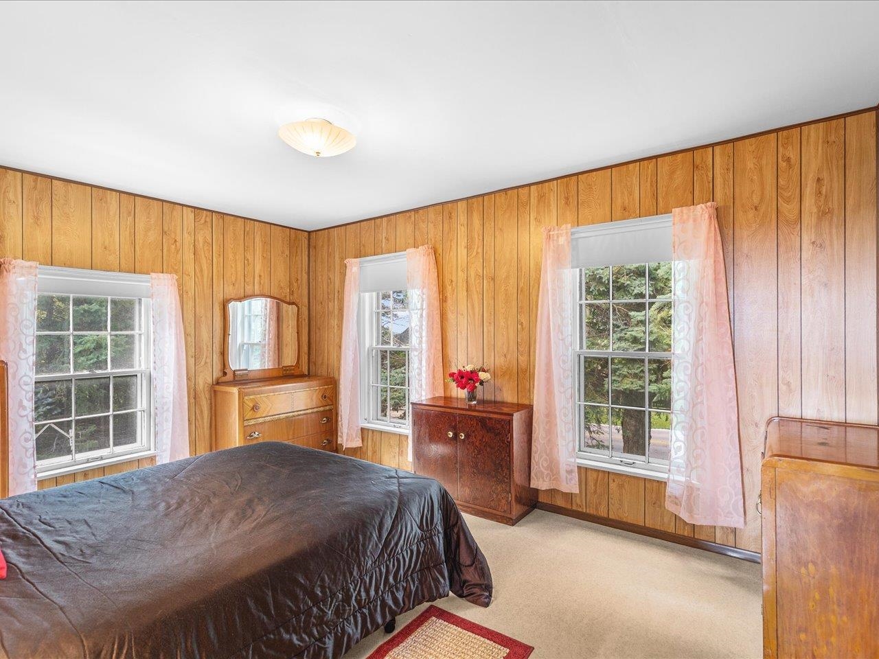 9311 State Line Road Capron, IL 61012 - Photo 46 of 51 a bedroom with a bed and wooden floor