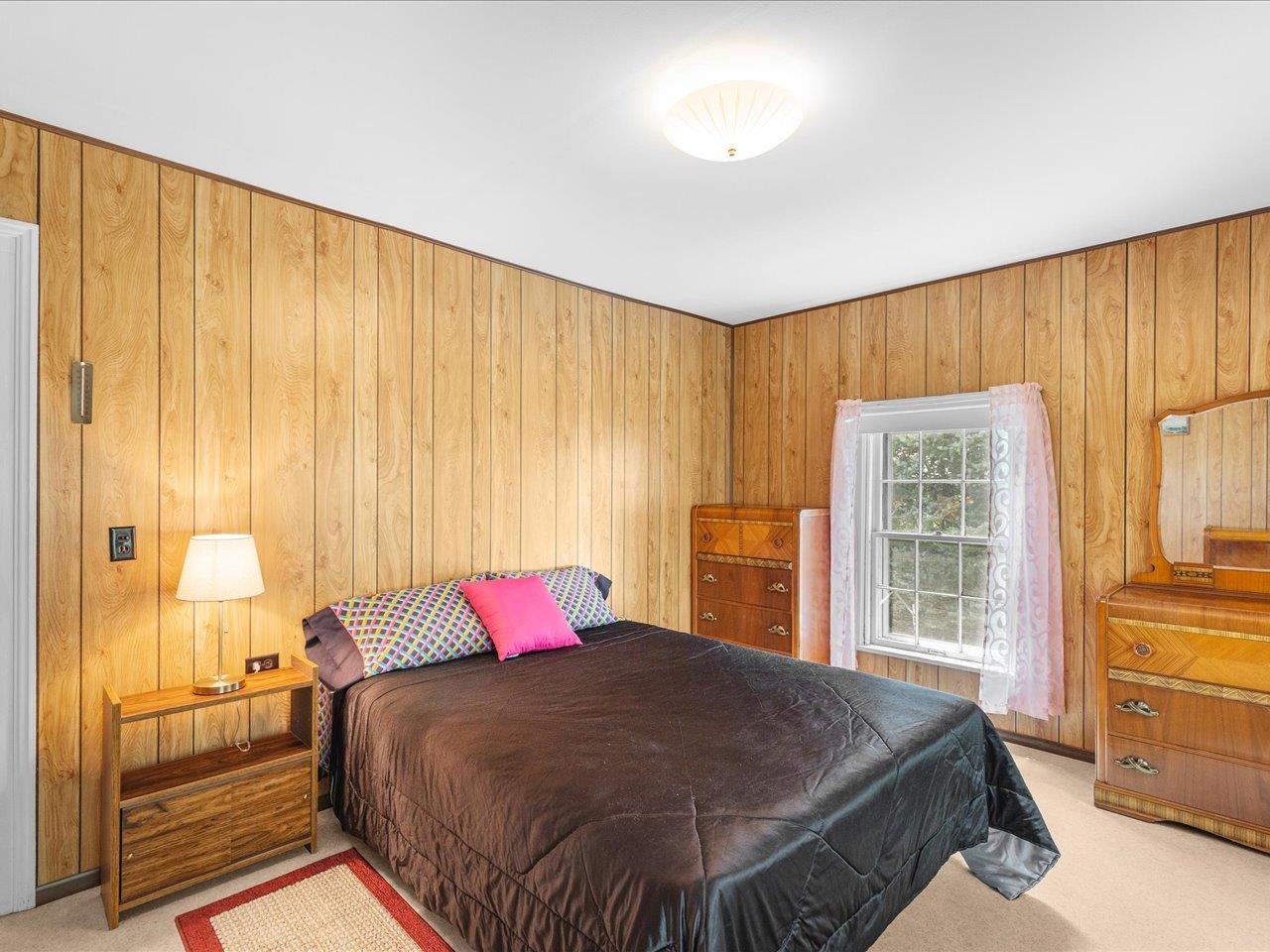 9311 State Line Road Capron, IL 61012 - Photo 47 of 51 a bed sitting in a bedroom next to a window