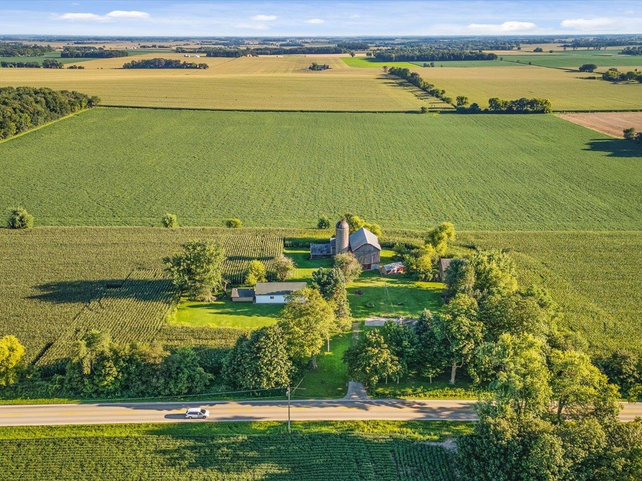 9311 State Line Road Capron, IL 61012 - Photo 6 of 51 an aerial view of a city with outdoor space