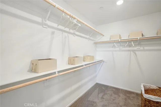 a view of storage and utility room with a sink