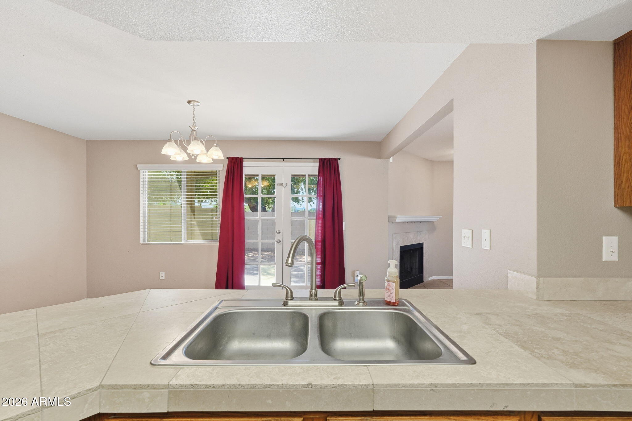 1229 North Alma School Road, Unit 1 Mesa, AZ 85201 - Photo 16 of 38 a kitchen with a sink and a counter top space