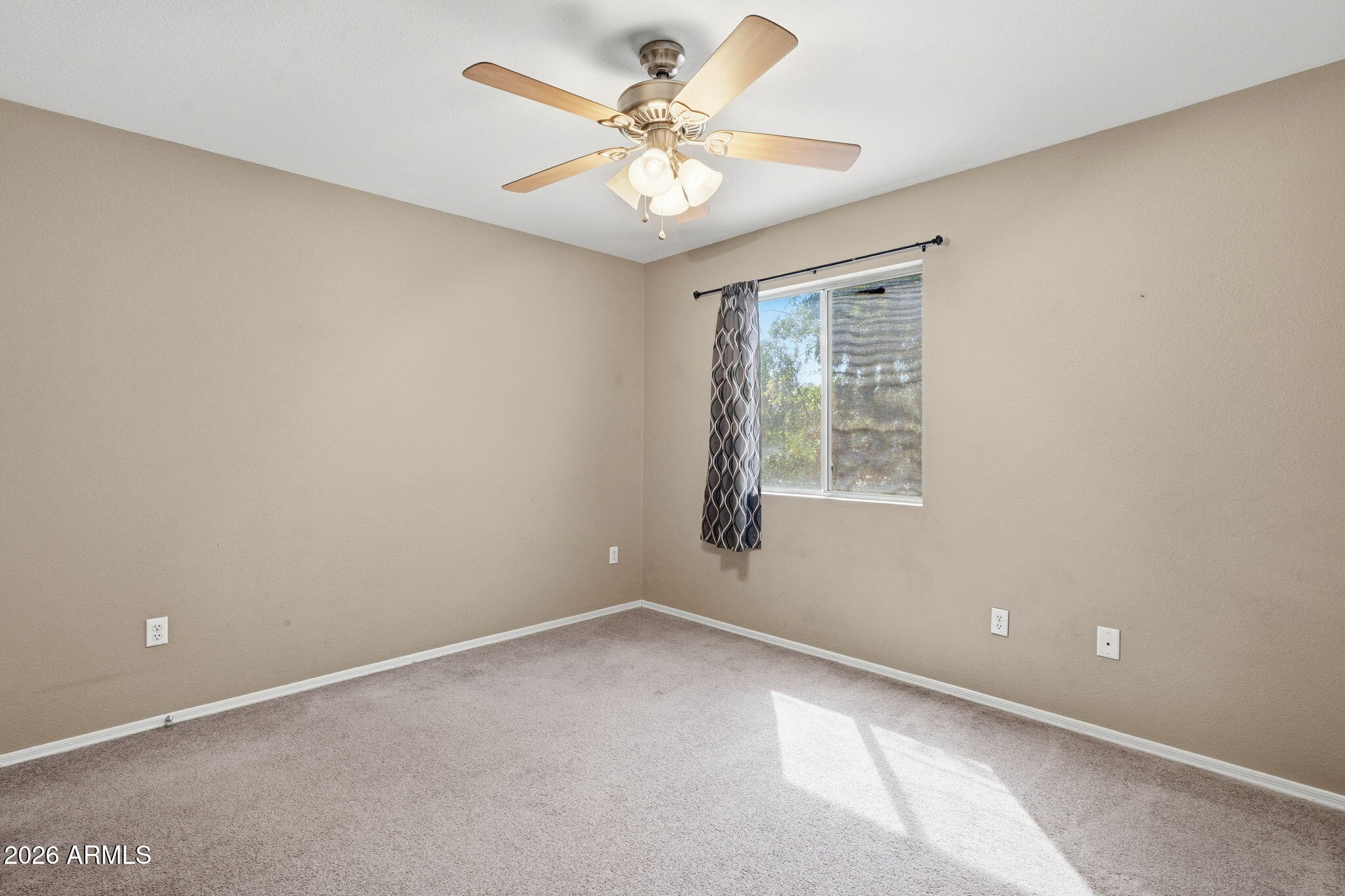 1229 North Alma School Road, Unit 1 Mesa, AZ 85201 - Photo 25 of 38 a view of an empty room with a window