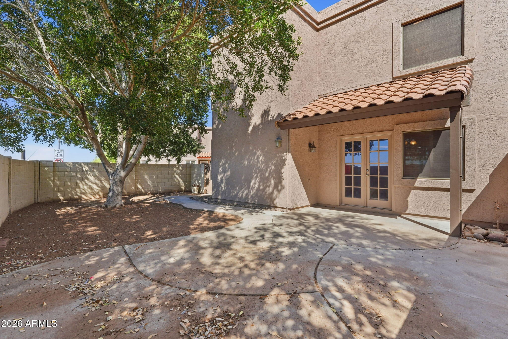 1229 North Alma School Road, Unit 1 Mesa, AZ 85201 - Photo 29 of 38 a view of a house with a tree