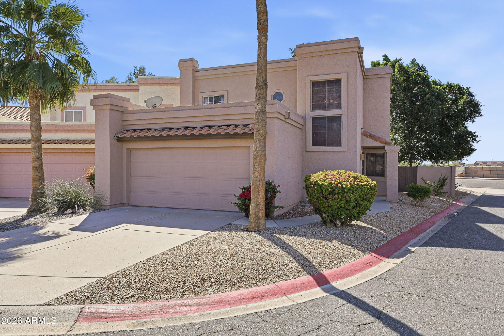 1229 North Alma School Road, Unit 1 Mesa, AZ 85201 - Photo 32 of 38 a view of multiple house with potted plants