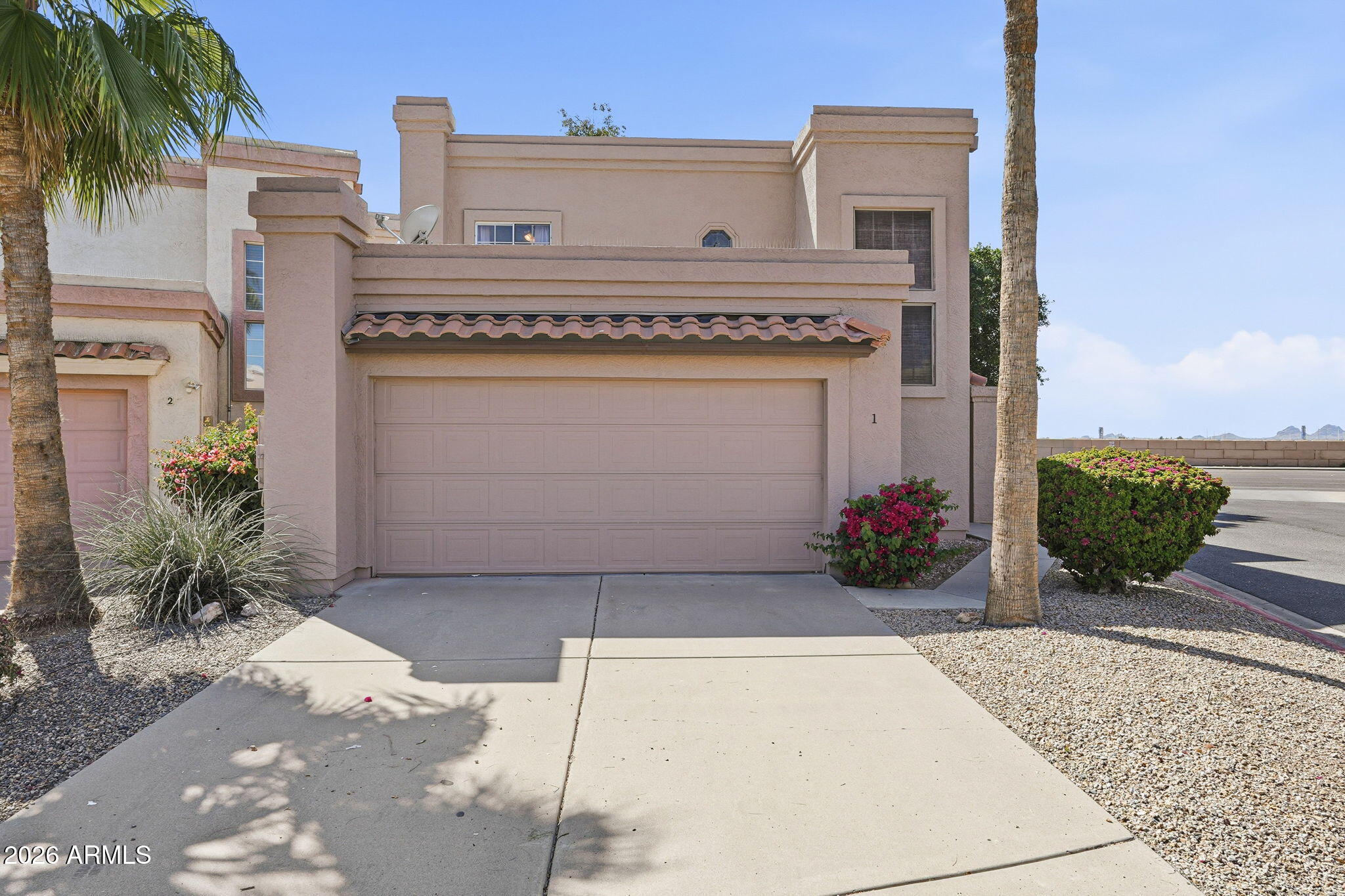 1229 North Alma School Road, Unit 1 Mesa, AZ 85201 - Photo 38 of 38 a front view of a house with garden