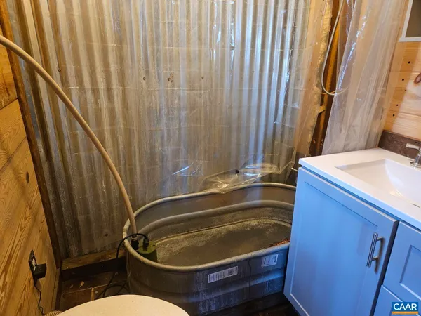 a bathroom with a sink and a toilet