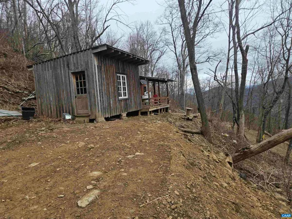 a house with trees in front of it