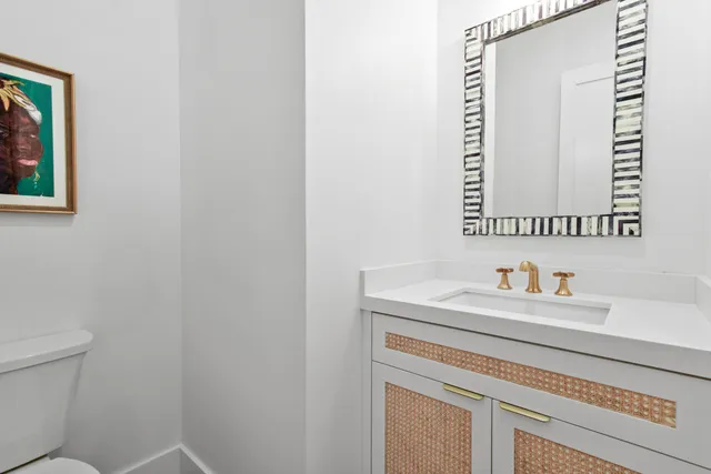 a bathroom with a sink and a toilet