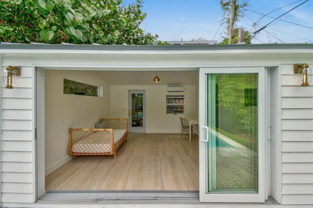 a view of backyard with a potted plant
