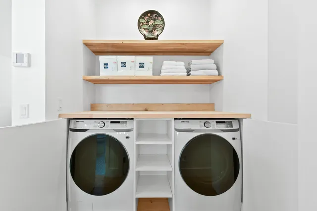 a view of washer and dryer in a utility room