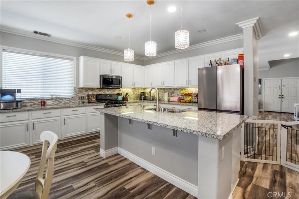 29061 La Ladera Road Menifee, CA 92584 - Photo 13 of 57 Upgrades kitchen with center island