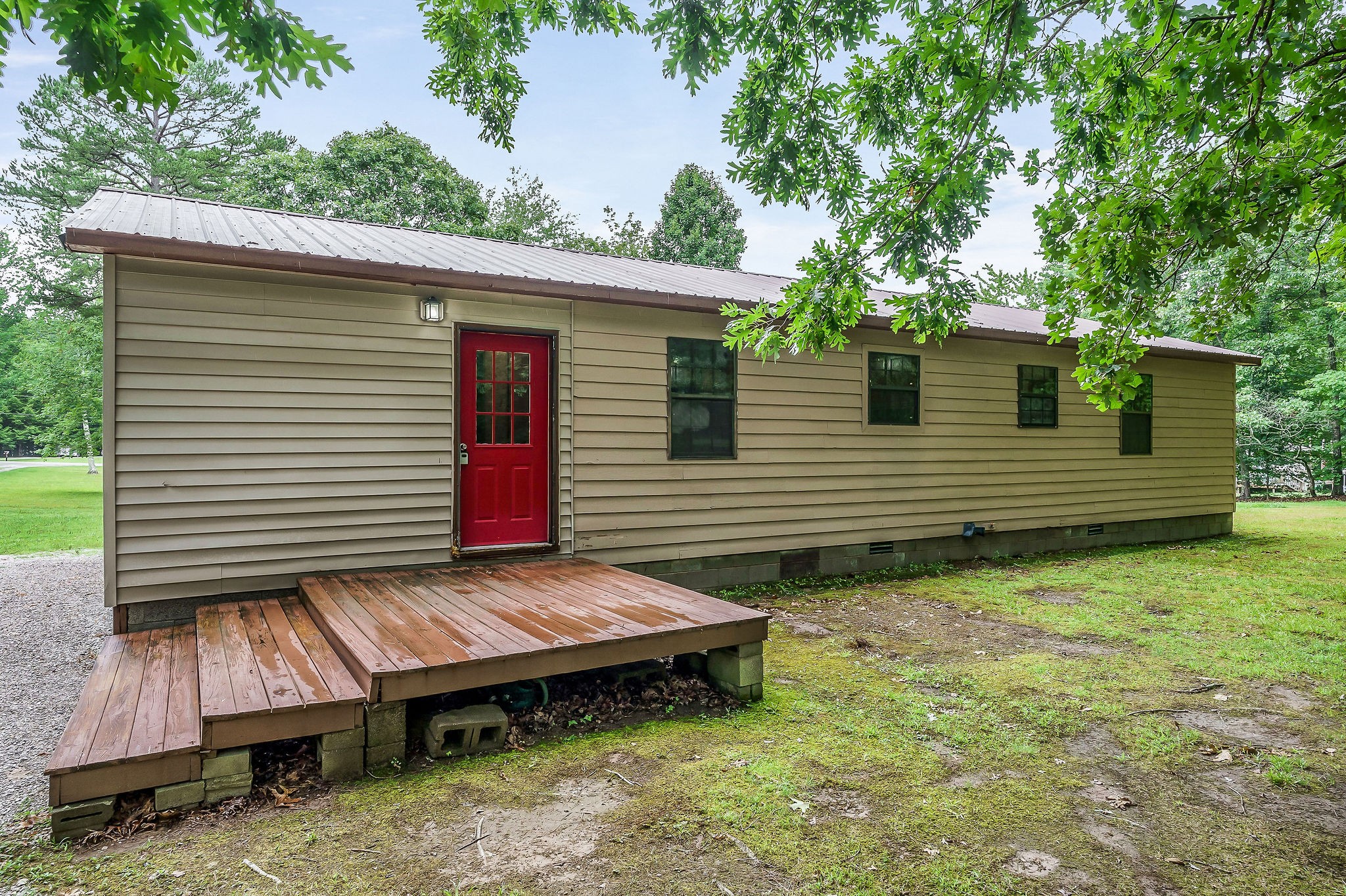 569 Robs Road Grimsley, TN 38565 - Photo 28 of 40 a view of a small house in the back yard