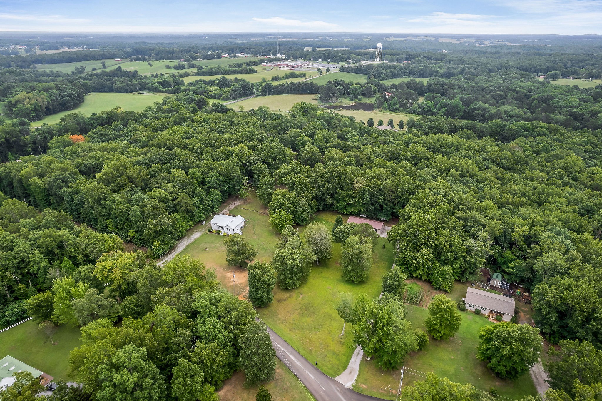569 Robs Road Grimsley, TN 38565 - Photo 35 of 40 an aerial view of residential houses with outdoor space and trees