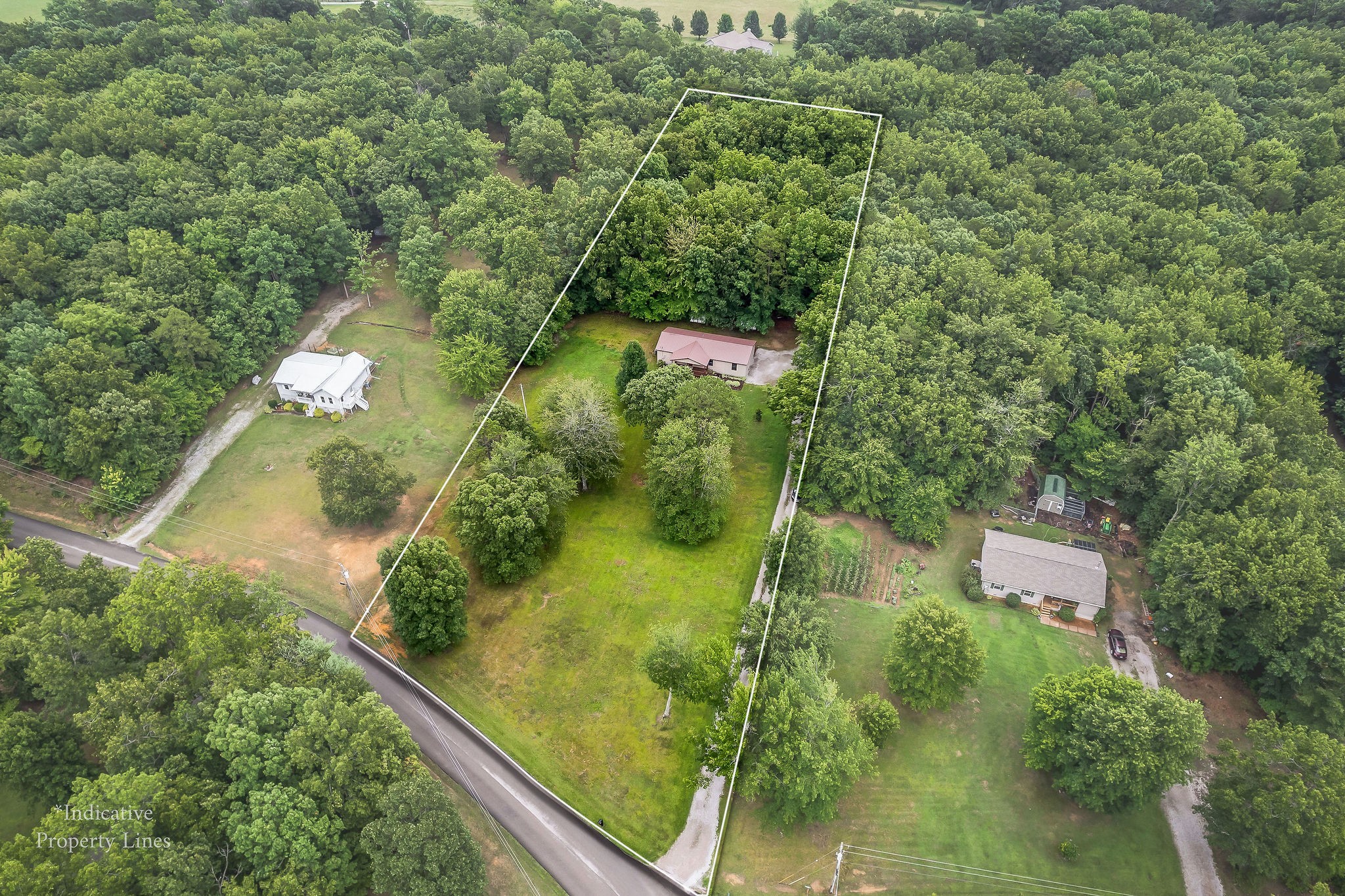 569 Robs Road Grimsley, TN 38565 - Photo 37 of 40 an aerial view of residential houses with outdoor space
