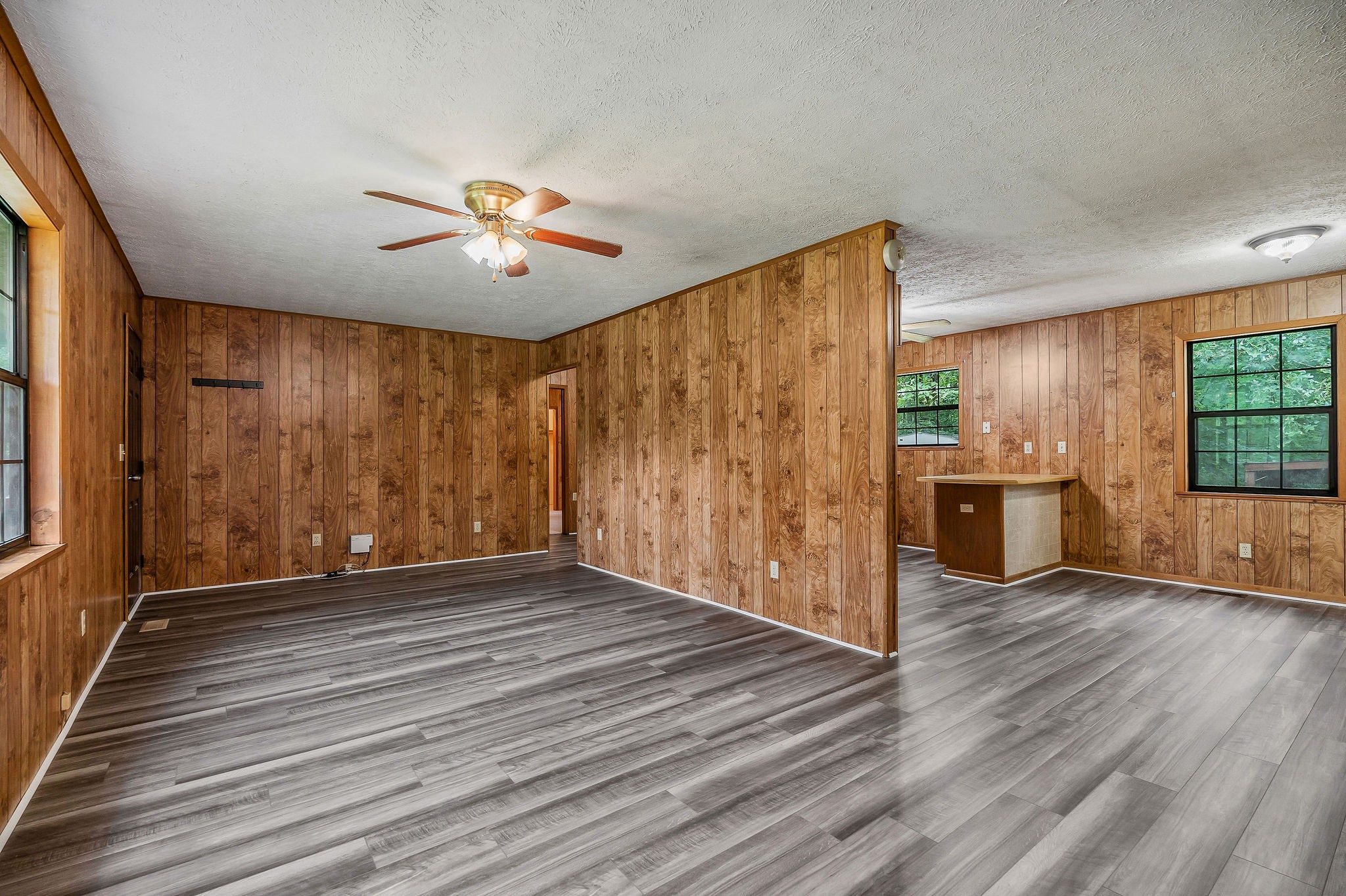 569 Robs Road Grimsley, TN 38565 - Photo 4 of 40 a view of an empty room with a window and wooden floor