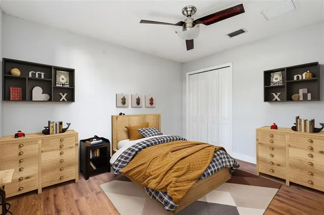 an aerial view of a house with a swimming pool