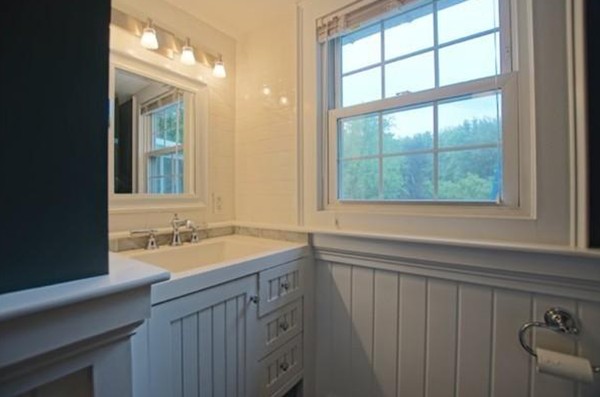 54 Forest Road Salisbury, MA 01952 - Photo 13 of 17 a bathroom with a sink and a window