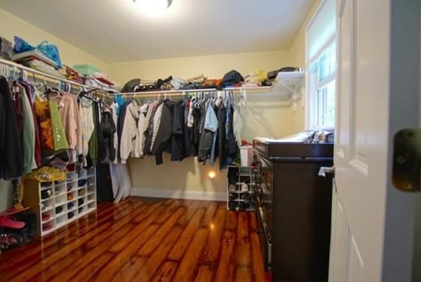 54 Forest Road Salisbury, MA 01952 - Photo 8 of 17 a view of walk in closet with clothes and shoes