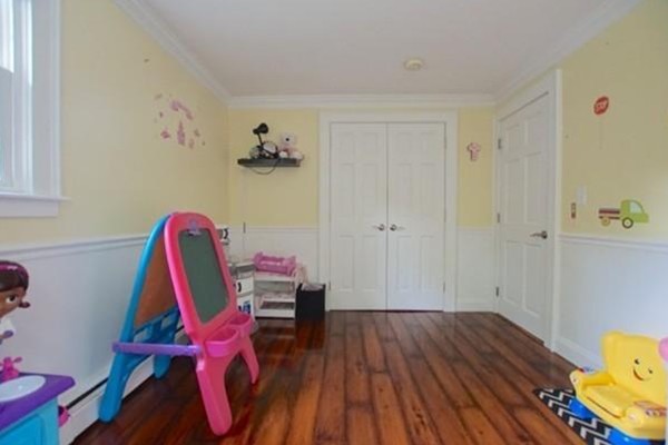 54 Forest Road Salisbury, MA 01952 - Photo 9 of 17 a view of a room with wooden floor and furniture