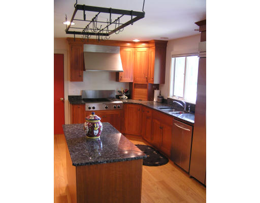 31 Poplar Hill Road Whately, MA 01093 - Photo 2 of 30 a kitchen with stainless steel appliances granite countertop a sink a stove and a refrigerator