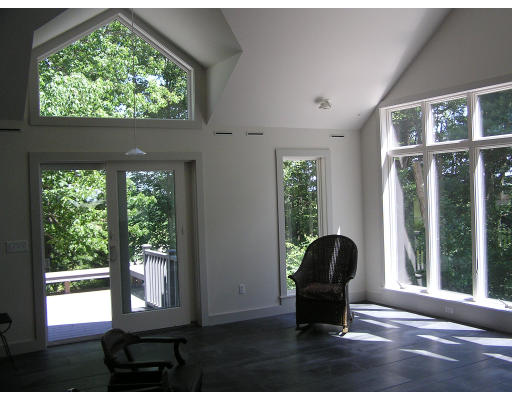 31 Poplar Hill Road Whately, MA 01093 - Photo 10 of 30 a living room with a large window and floor to ceiling window