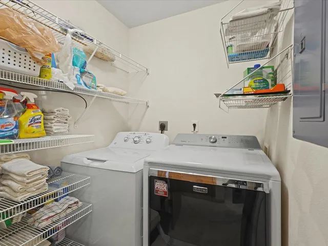 a utility room with dryer and washer