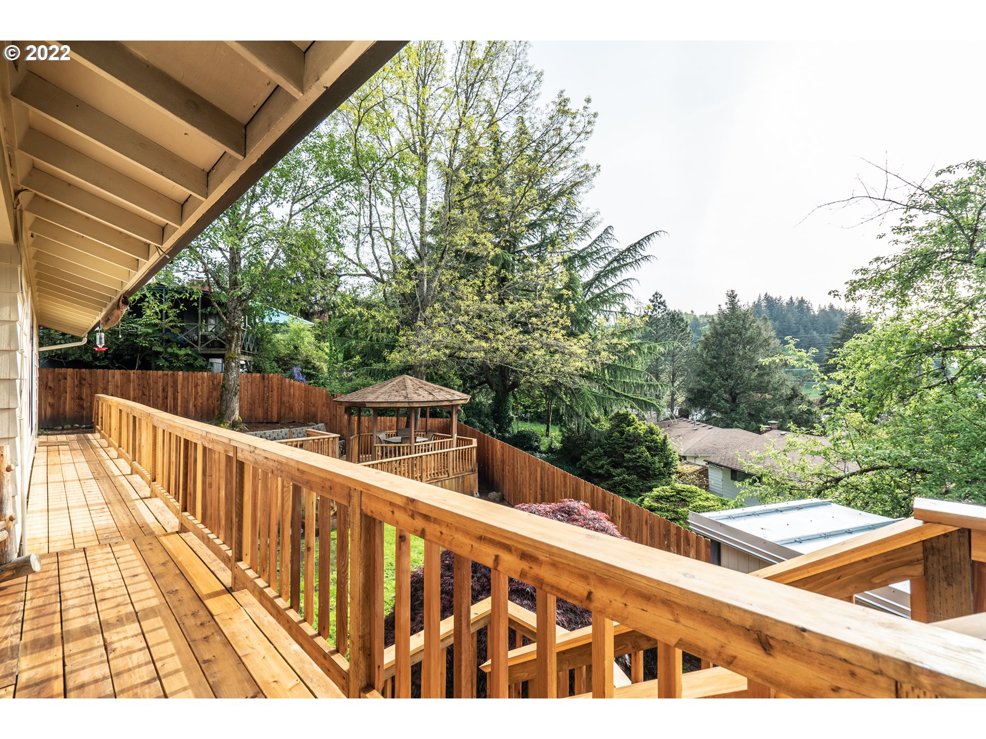 815 Northwest Mawrcrest Drive Gresham, OR 97030 - Photo 25 of 30 a view of balcony with wooden floor and fence