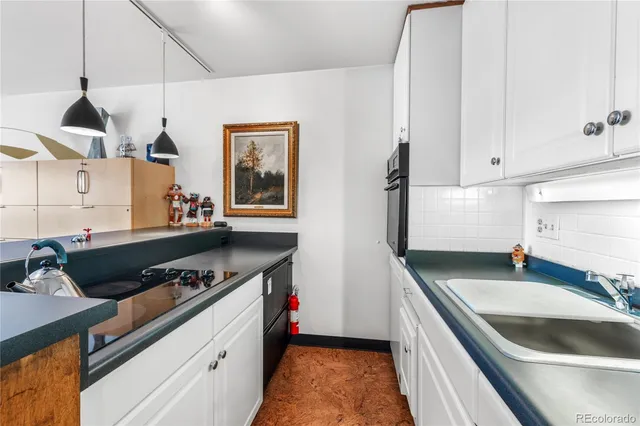 a workspace with furniture and gym equipment