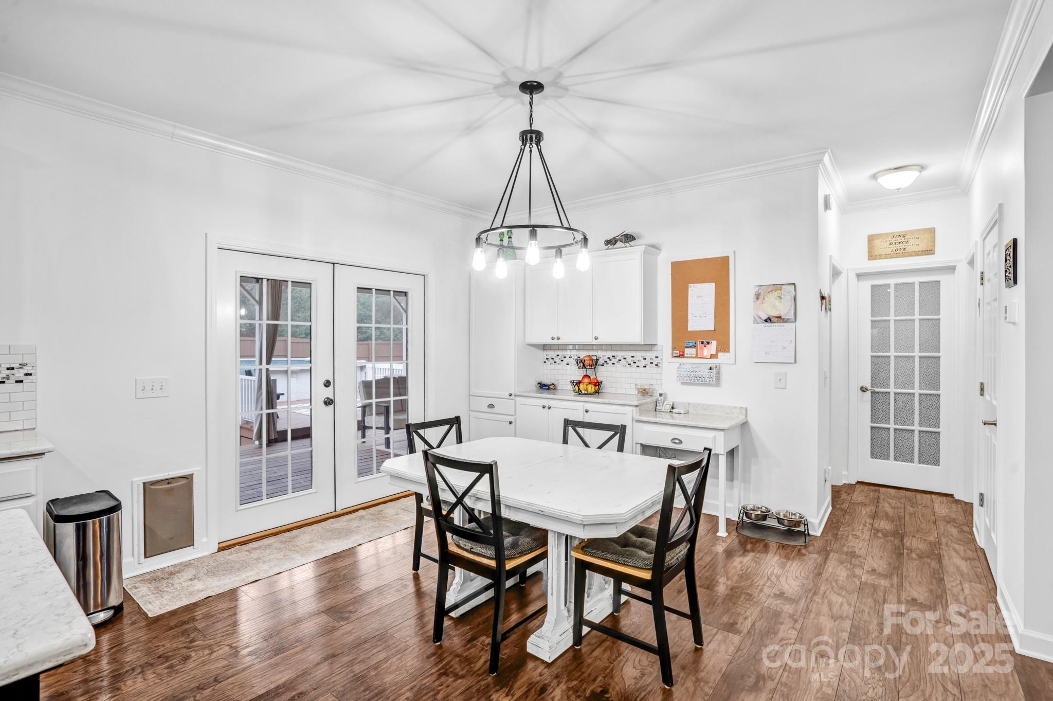 165 Kimball Loop China Grove, NC 28023 - Photo 11 of 48 a view of a dining room with furniture window and wooden floor