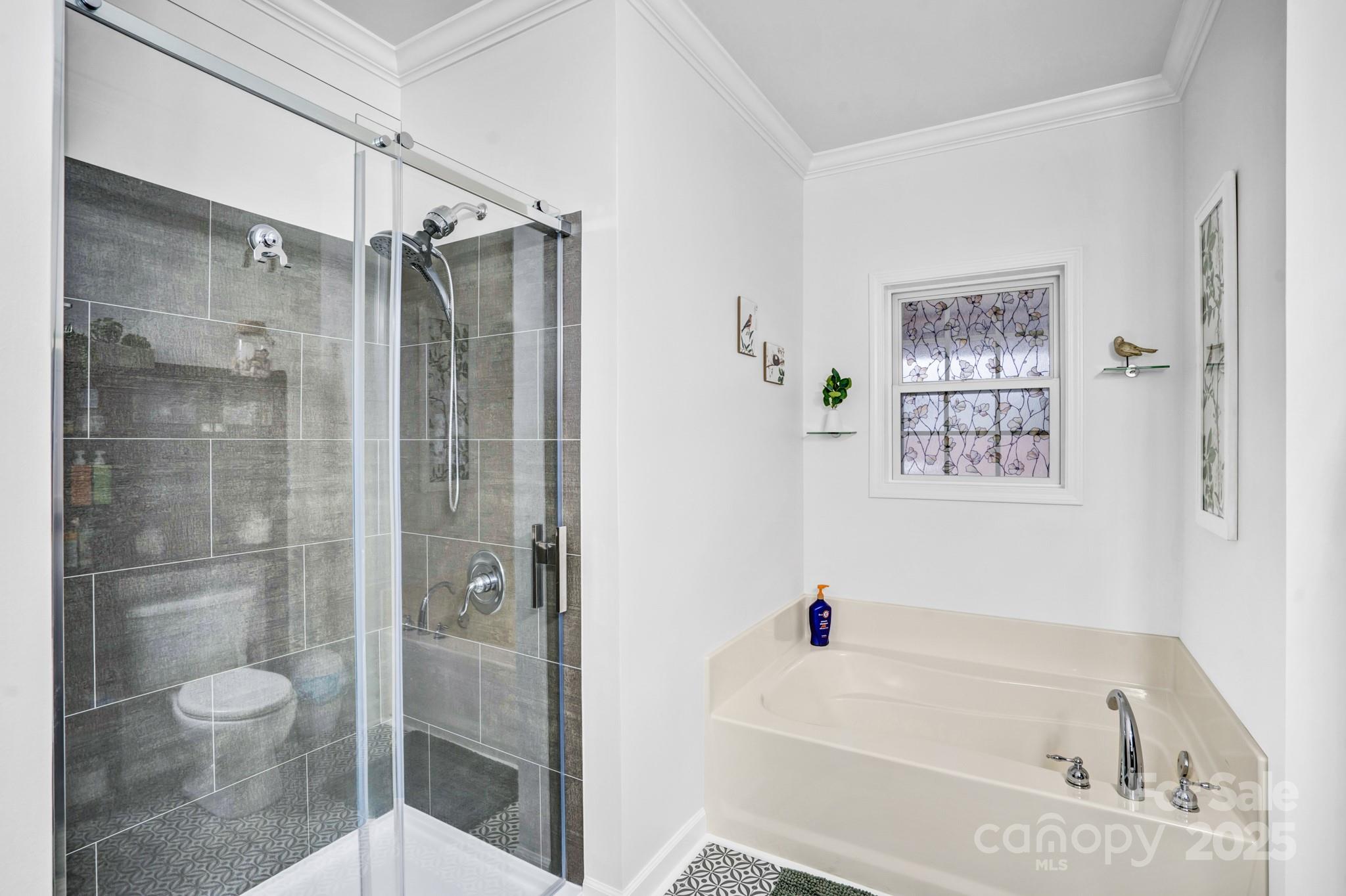 165 Kimball Loop China Grove, NC 28023 - Photo 27 of 48 a bathroom with a bathtub and a shower