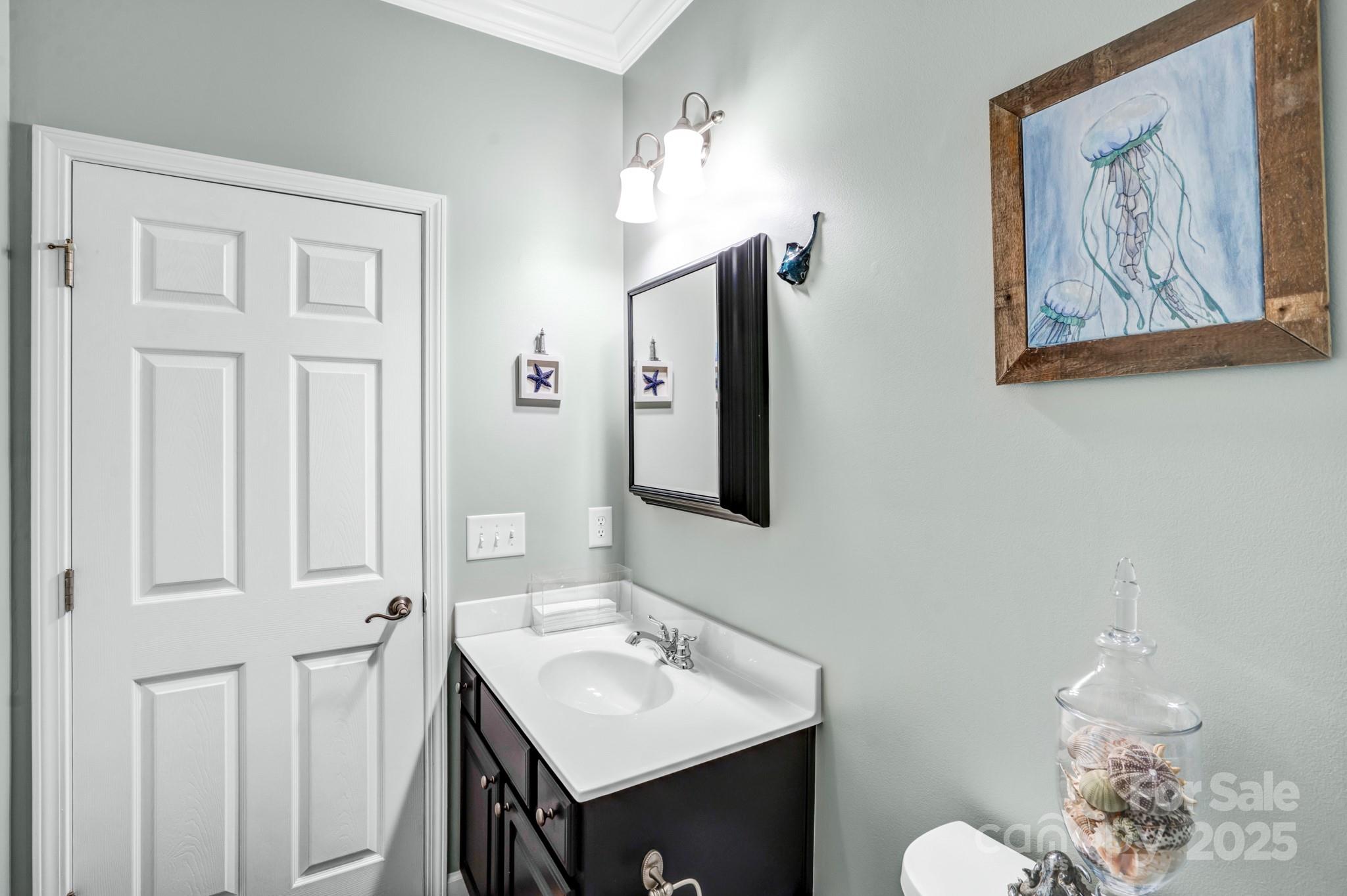 165 Kimball Loop China Grove, NC 28023 - Photo 30 of 48 a bathroom with a sink vanity and a mirror