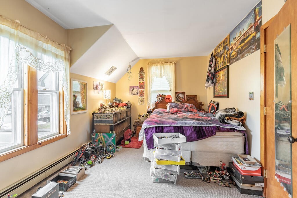 8 Boston Road Sutton, MA 01590 - Photo 12 of 30 a bed room with a bed and a window
