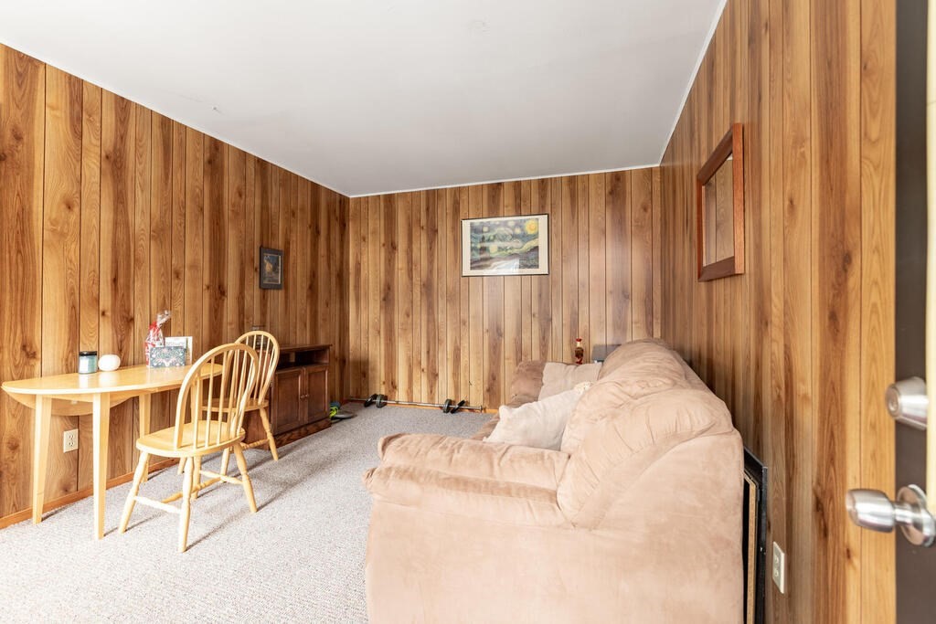 8 Boston Road Sutton, MA 01590 - Photo 14 of 30 a bed room with a bed and a chair