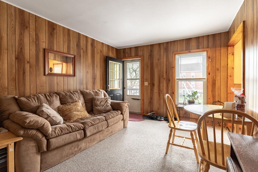 8 Boston Road Sutton, MA 01590 - Photo 15 of 30 a living room with furniture and large windows