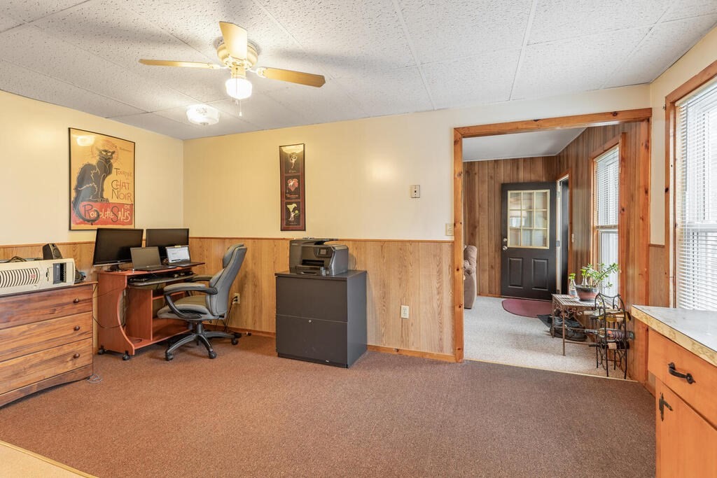 8 Boston Road Sutton, MA 01590 - Photo 16 of 30 a view of a workspace with furniture and a window