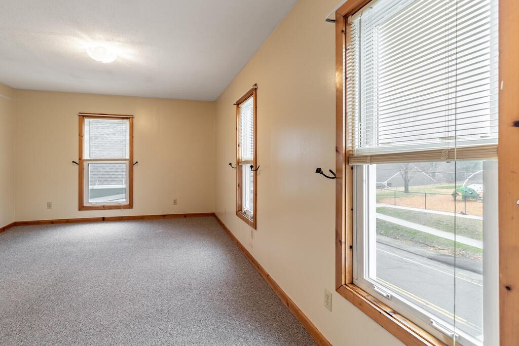 8 Boston Road Sutton, MA 01590 - Photo 22 of 30 an empty room with windows