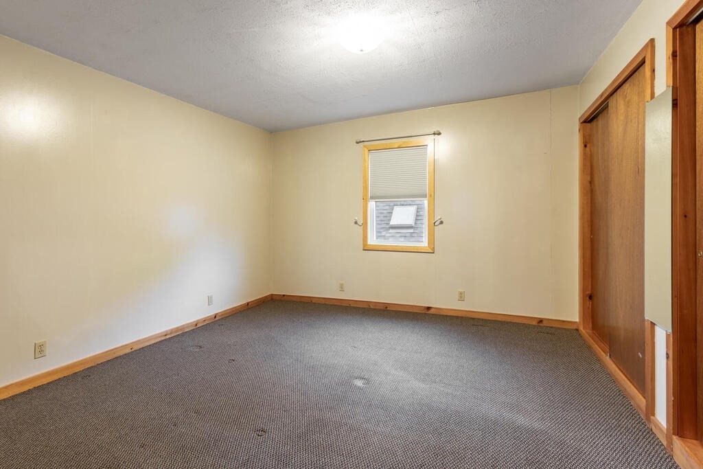 8 Boston Road Sutton, MA 01590 - Photo 24 of 30 an empty room with a window