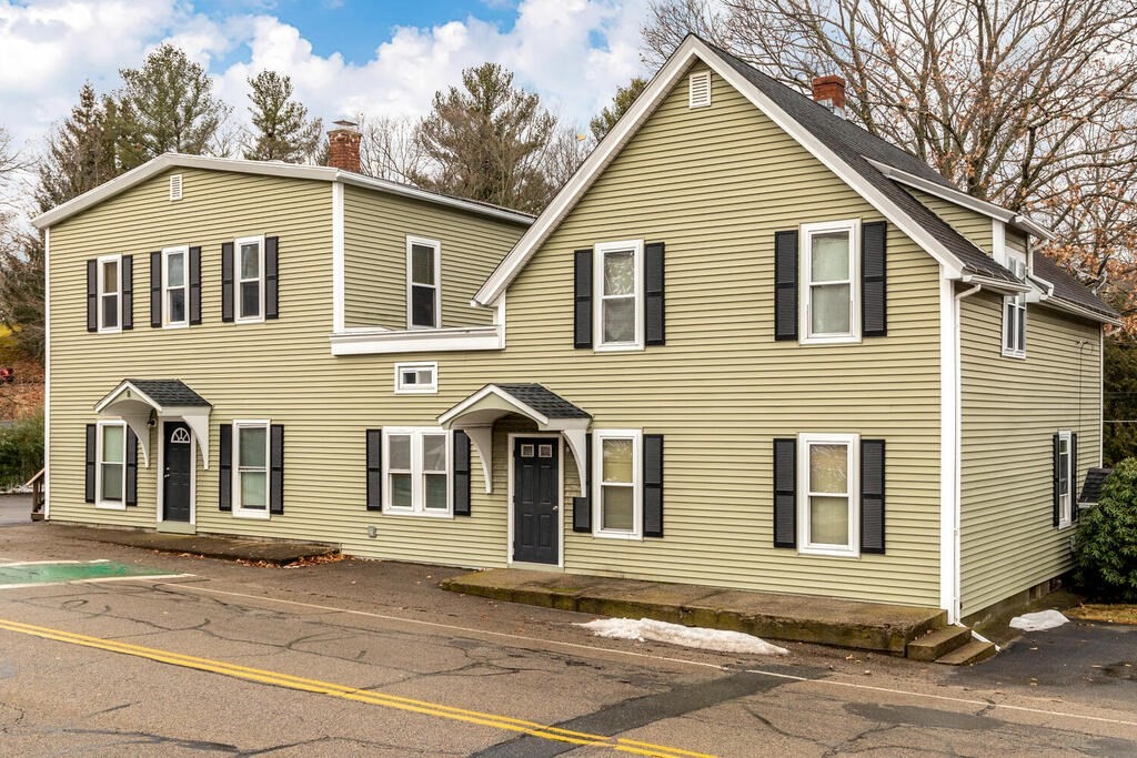 8 Boston Road Sutton, MA 01590 - Photo 3 of 30 a front view of a house