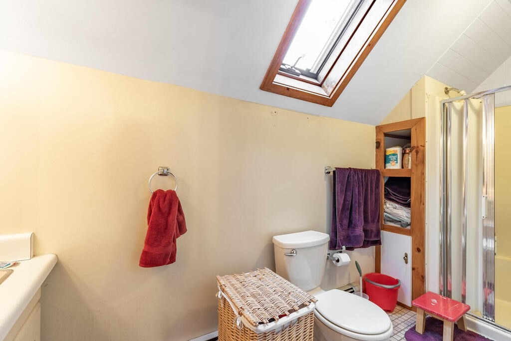 8 Boston Road Sutton, MA 01590 - Photo 10 of 30 a bathroom with a sink toilet and shower