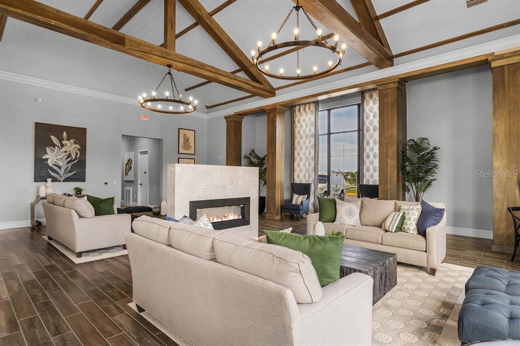 2851 House Finch Road St. Cloud, FL 34773 - Photo 31 of 52 a living room with furniture and a large window