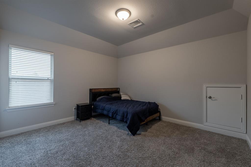 3612 Elizabeth Street Rowlett, TX 75088 - Photo 15 of 23 a living room with furniture and a window