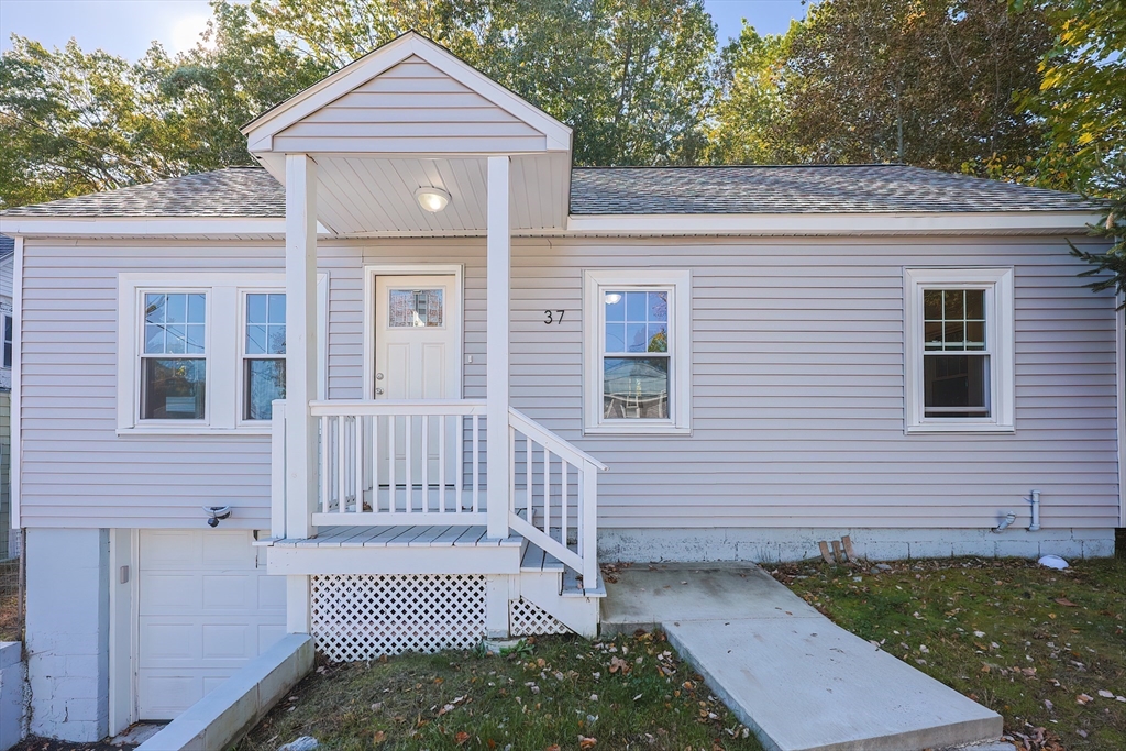 37 Maplewood Avenue Methuen, MA 01844 - Photo 2 of 42 a front view of a house with balcony