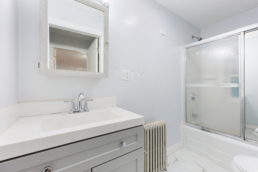 37 Maplewood Avenue Methuen, MA 01844 - Photo 26 of 42 a bathroom with a sink a toilet and shower