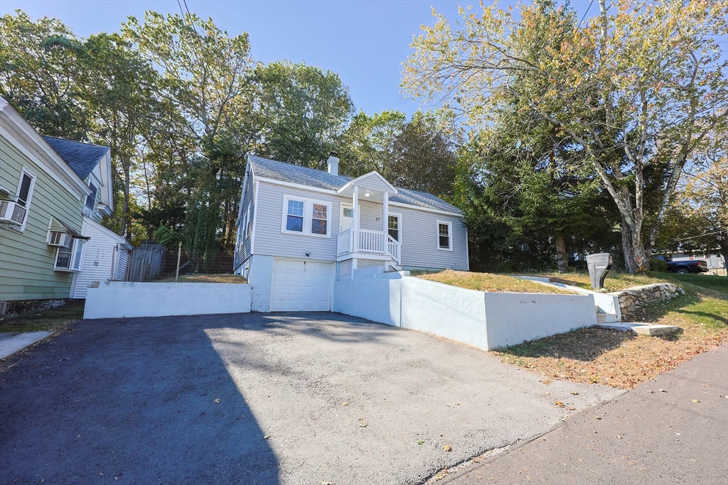 37 Maplewood Avenue Methuen, MA 01844 - Photo 3 of 42 a view of a house with backyard and trees