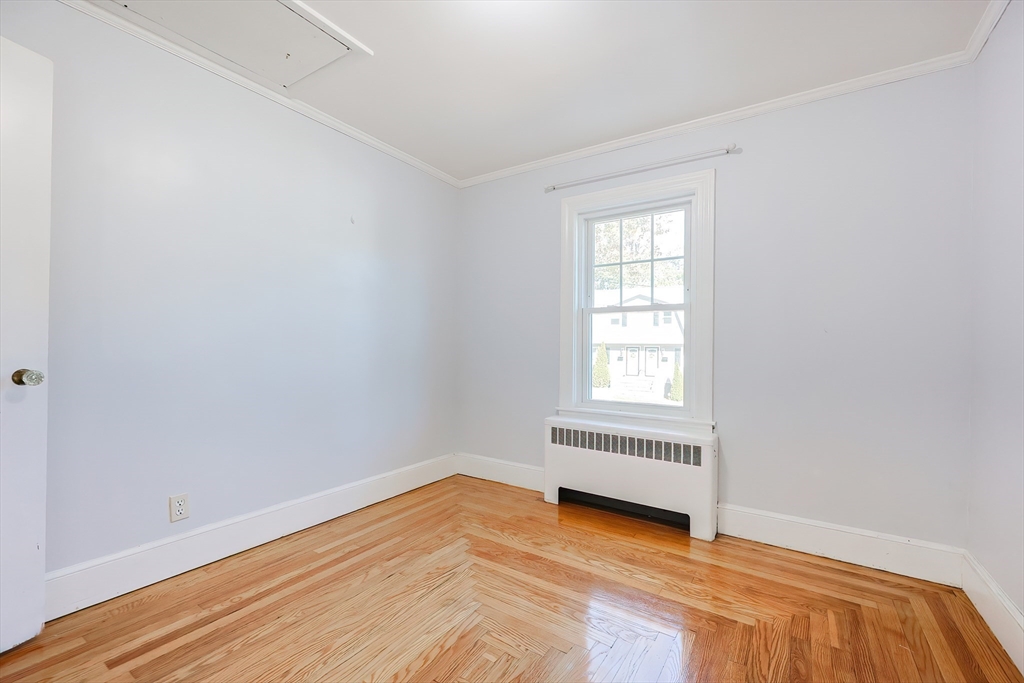 37 Maplewood Avenue Methuen, MA 01844 - Photo 31 of 42 a view of empty room with wooden floor and fan