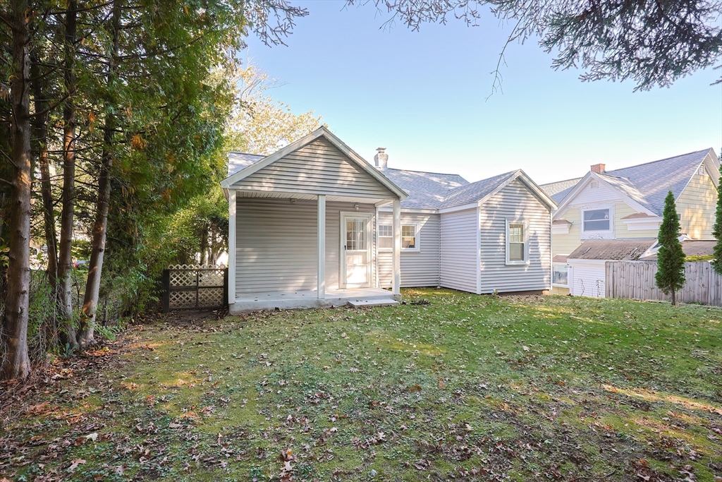 37 Maplewood Avenue Methuen, MA 01844 - Photo 39 of 42 a view of a house with a yard and large tree