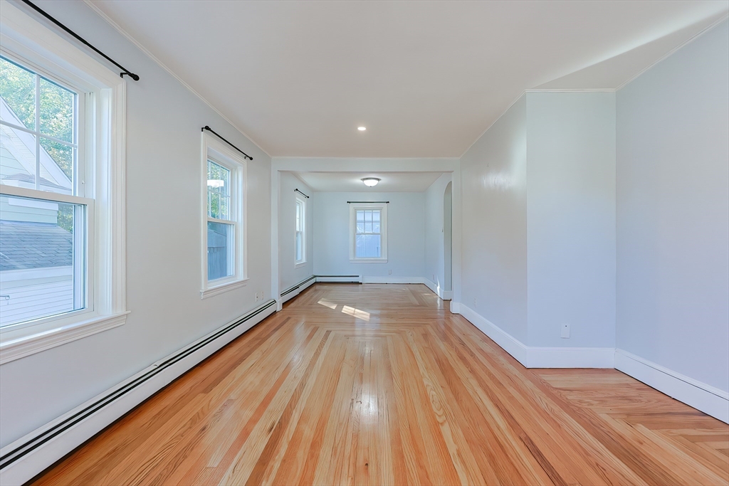 37 Maplewood Avenue Methuen, MA 01844 - Photo 6 of 42 a view of empty room with wooden floor and fan