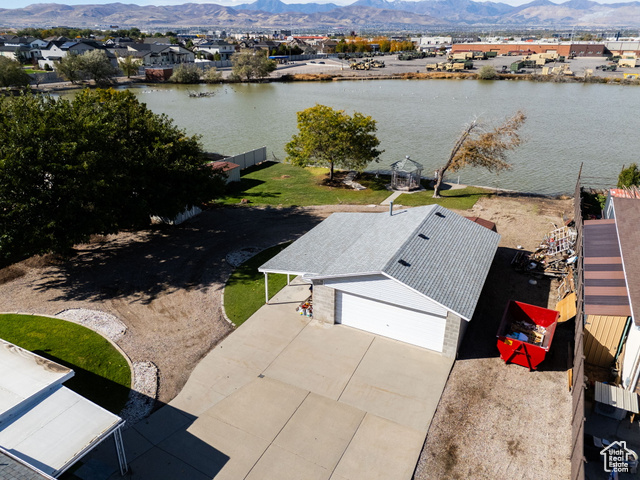 12958 South 300 East Draper, UT 84020 - Photo 11 of 38 Aerial perspective of suburban area featuring a water and mountain view